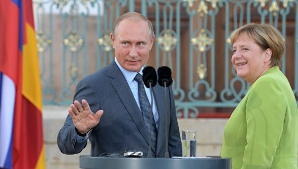 Путин кратко побеседовал с Меркель на G20